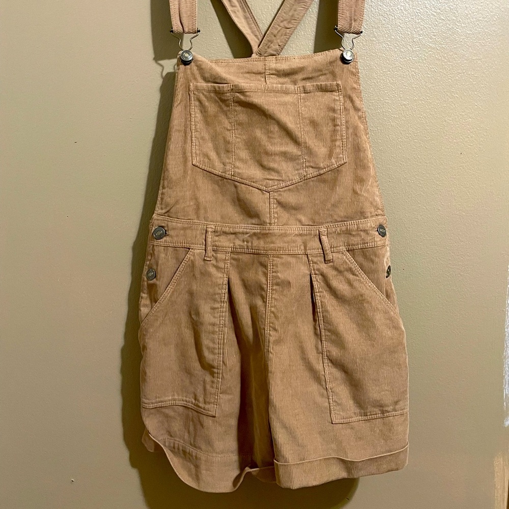 Over all’s corduroy tan colored